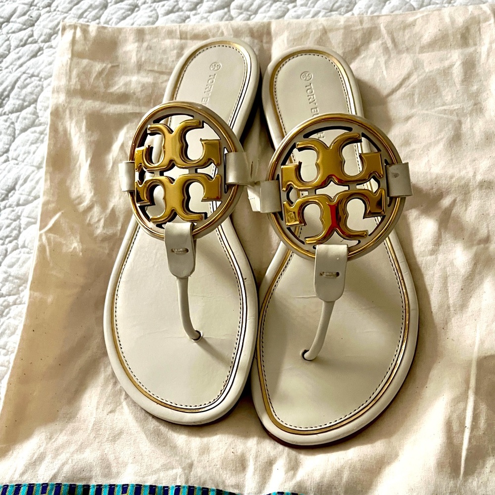 Tory Burch Cream and Gold Millers size 10 like new condition.